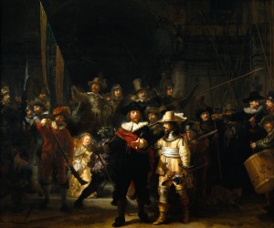 Rembrandt's masterpiece The Night Watch, showing a group portrait of militiamen in uniform with their weapons against a darkened background.
