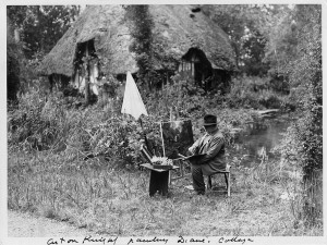 a photograph of Louis Aston Knight painting outside of Diane's cottage.