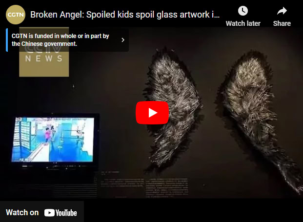 a link to a video by chaperones showing children damaging the sculpture