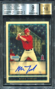 Baseball card, man in red and white, blue signature