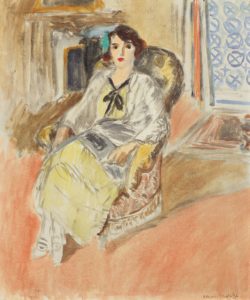 woman seated in a chair