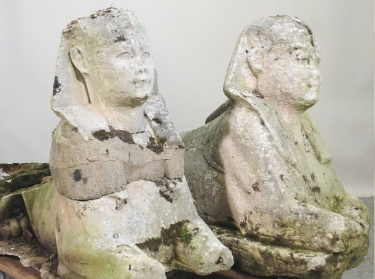 two ancient Egyptian stone sphinxes antiquities