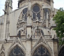 A view of the exterior of Notre Dame in Paris from the east side.