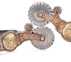 slver, gold and leather cowboy spurs