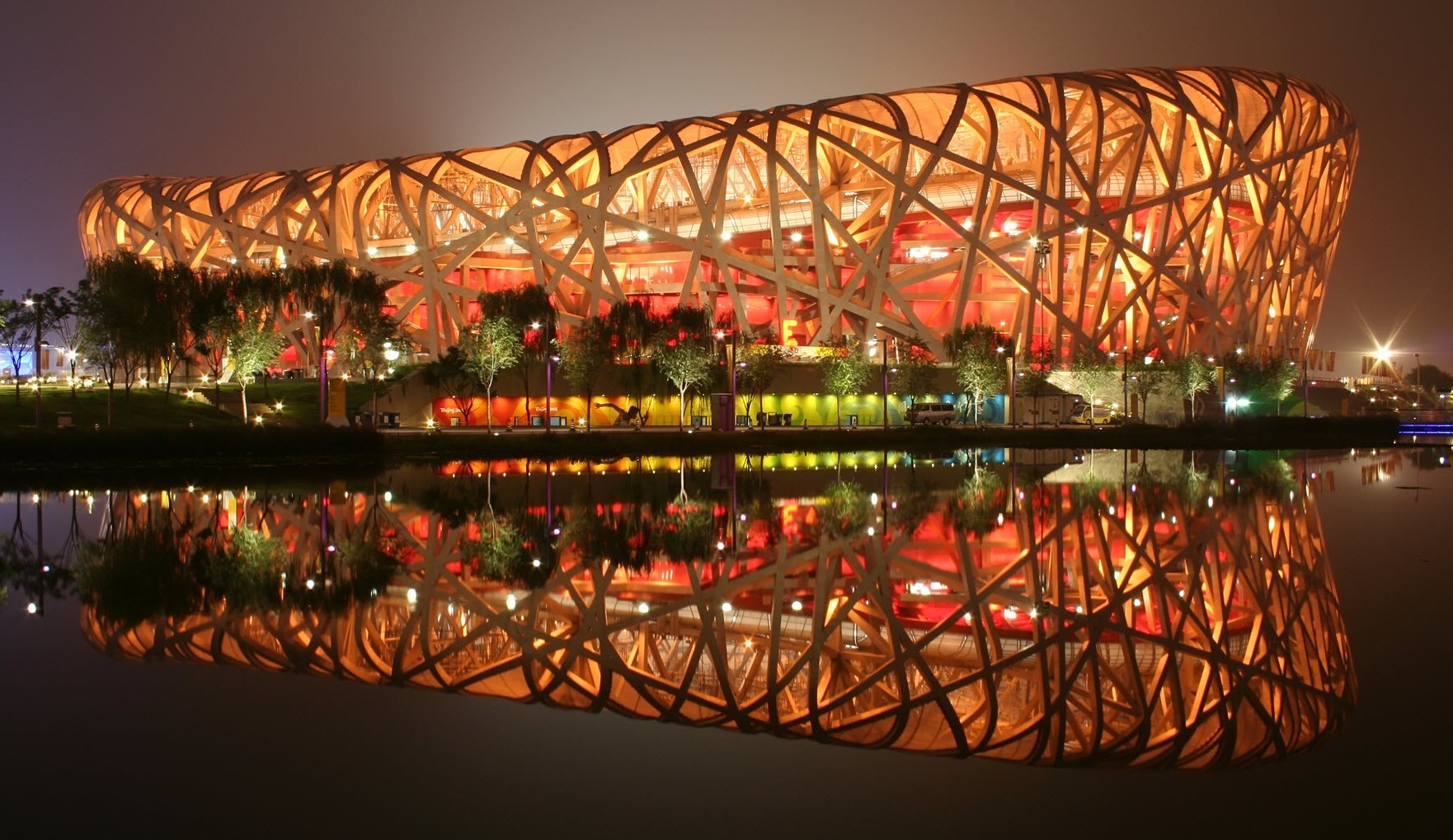 Beijing National Stadium at dusk with its light on