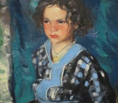 A young girl in a blue dress