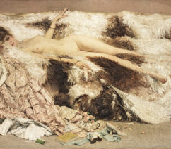 A nude woman reclining of a sofa after a night at the ball sold at Bonhams