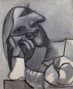 An abstract, grey and white portrait of a woman by Pablo Picasso