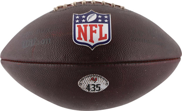 NFL football thrown by Tom Brady in playoff game in january 2022
