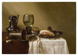 A still life from the Dutch Golden Age by Willem Claesz. Heda featuring pewter plates, an overturned silver beaker resting on a pewter plate and a ham upon another pewter plate, all upon a partially draped table, sold at Sotheby's