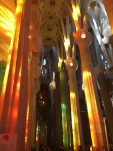 The interior of the Sagrada Família in sunlight 