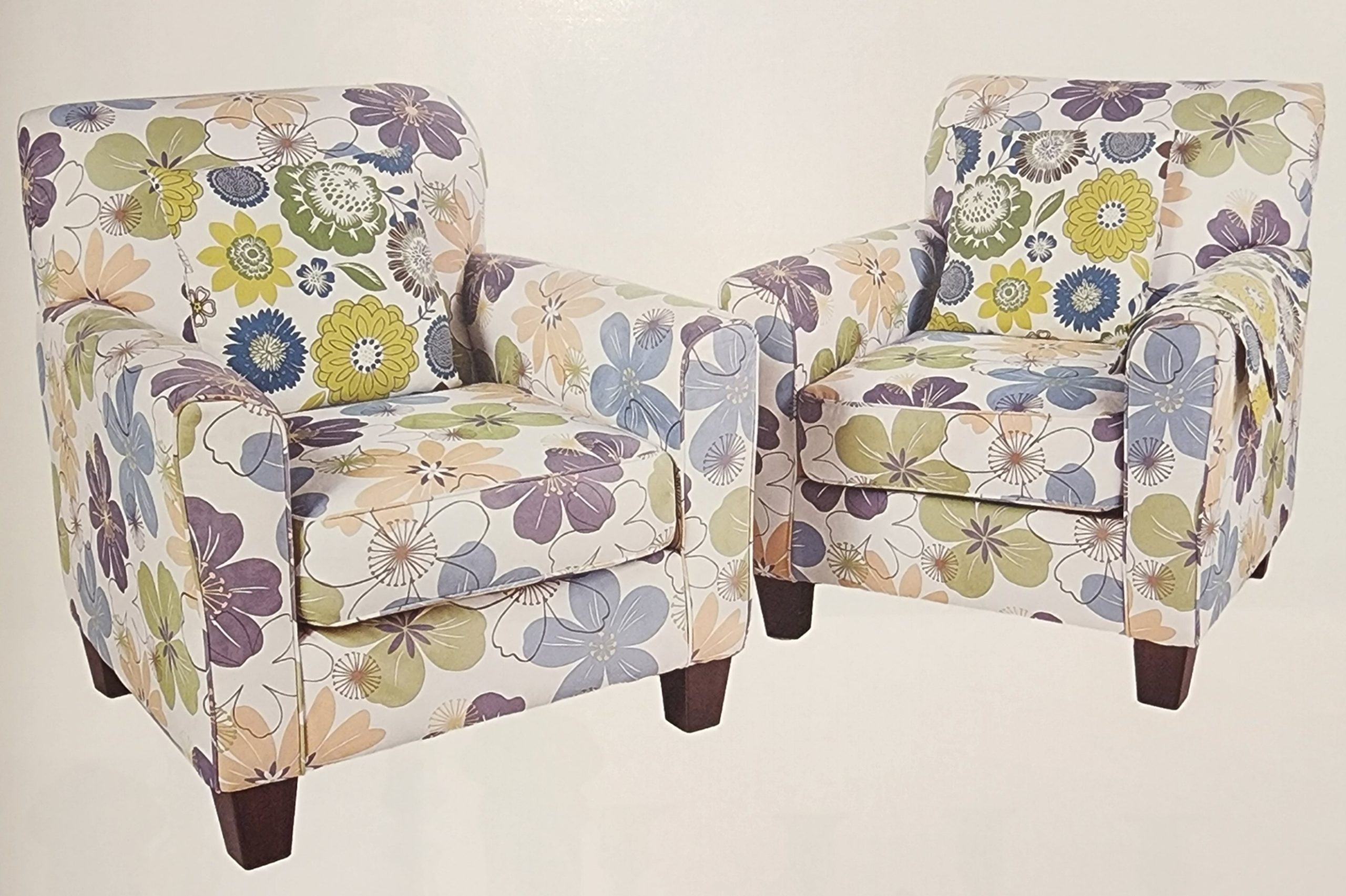 Two floral covered vintage chairs from Betty White's home