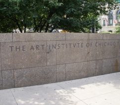 A stone sign indicating the entrance to the Art Institute of Chicago