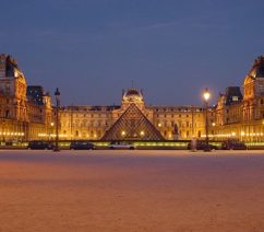The Louvre at night, with I.M. Pei's famous glass pyramid outside