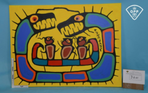 A painting in an indigenous Canadian style of several blue and red creatures on a yellow background.
