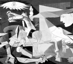 The anti-war painting Guernica by Pablo Picasso, showing a number of human and animal figures, both dead and alive, painted in black, white, and gray.