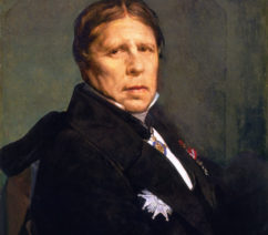 A self-portrait of a seated elderly man in a black suit, with the lapels covering medals attached to his breast.