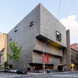 945 Madison Avenue, also known as the Breuer Building: a Brutalist, modernist building made of concrete and slate in what looks like an inverted ziggurat.
