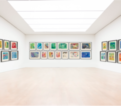 A colorful lithograph series displayed in rows on three walls of a gallery.