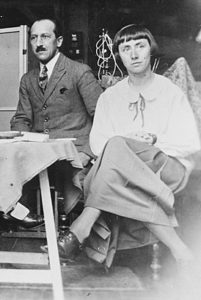 A photograph of Hannah Höch sitting with Piet Mondrian