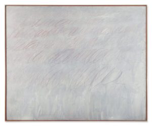 A large canvas pained gray, featuring faint scribbles and circles of crayon.