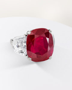 A large ruby set in a platinum ring supported by diamonds sold at Christie's World of Heidi Horten sale
