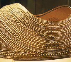 The Mold Gold Cape, an ancient cape made of sheet gold originally from a burial mound in Wales.