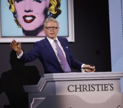 A photo of Christie's global president Jussi Pylkkänen at the rostrum during the Thomas and Doris Ammann collection