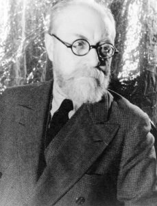 A black-and-white photograph of the artist Henri Matisse