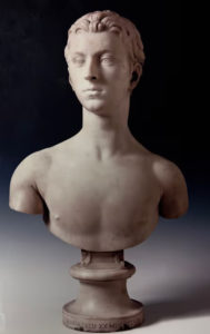 A marble bust by Emdé Bouchardon of a young man.