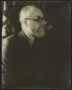 A photograph of Henri Matisse in profile.
