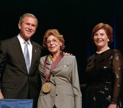 The artist Helen Frankenthaler receiving the National Medal of Arts, standing with President George W. Bush and First Lady Laura Bush.