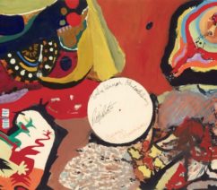 An abstract painting on paper, mostly in warm colors, with a large blank circle in the middle containing signatures.