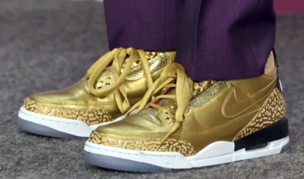 purple and gold air jordan sneakers fhat were made for spike lee