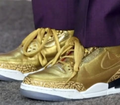 purple and gold air jordan sneakers fhat were made for spike lee