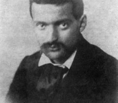 A black-and-white photograph of the painter Paul Cézanne at age 22