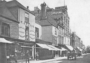 A black-and-white photograph of Cowgate in Peterborough, UK