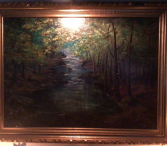 A photo of a landscape painting