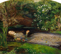A young woman in a dress floating in a pond surrounded by flowers.