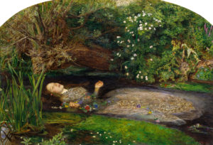 A young woman in a dress floating in a pond surrounded by flowers.