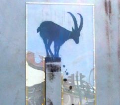 A graffiti silhouette of a goat