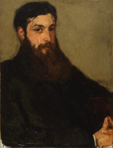 A portrait of a bearded man