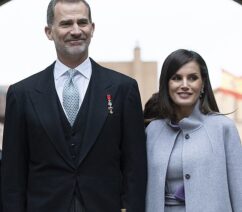 A picture of the king and queen of Spain in morning dress