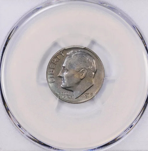 1975 Roosevelt dime in a holder, detail