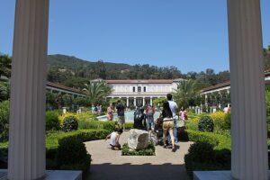 The interior courtyard of the Getty Villa in Los Angeles, with gardens and a reflecting pool.