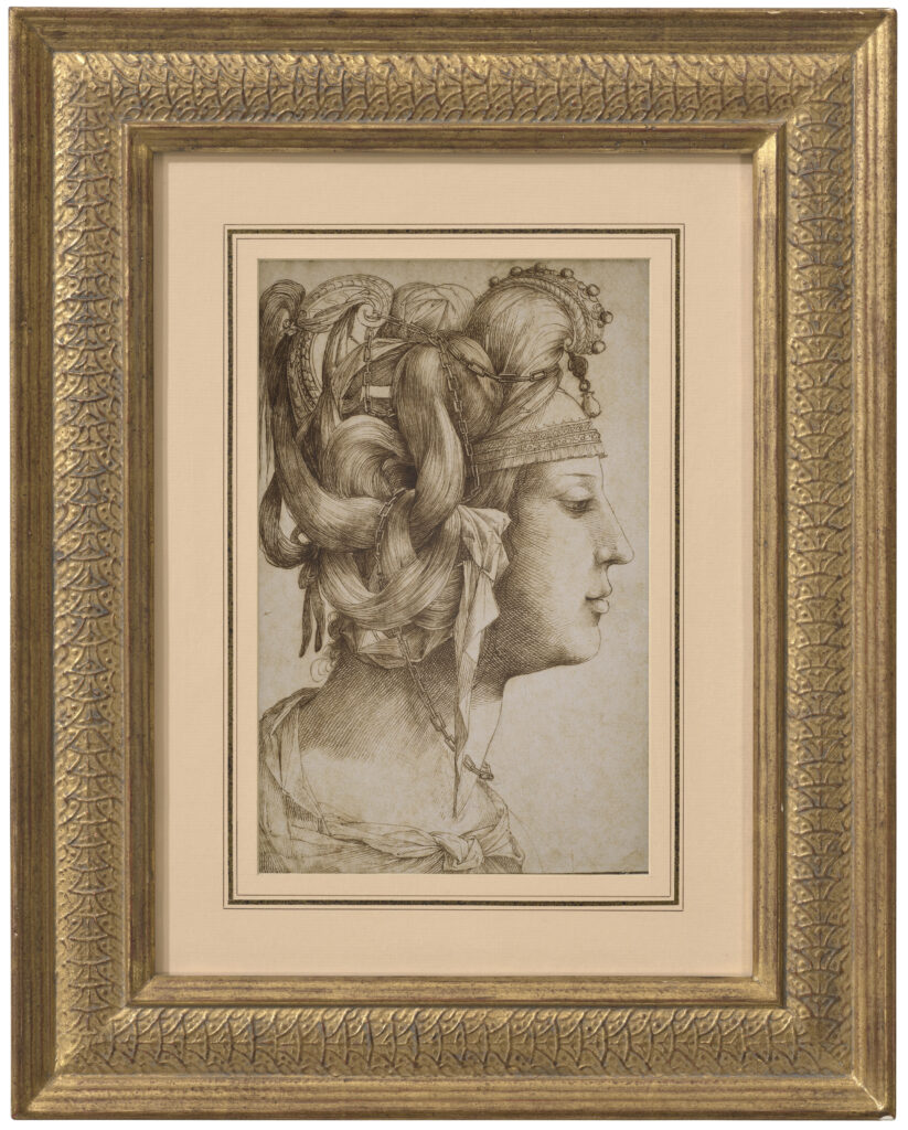 A chalk drawing of a woman in profile with an elaborate headdress.