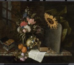 A 17th century still life painting with flowers, a skull, a book, a jewelry box, and a stone tablet.