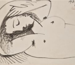 A drawing of a nude woman laying down from the waist up.