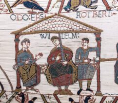 A segment of the Bayeux Tapestry, showing William the Conqueror in the center alongside his half-brothers Odo and Robert