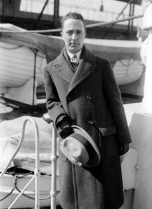 A black-and-white photograph of Norman Rockwell